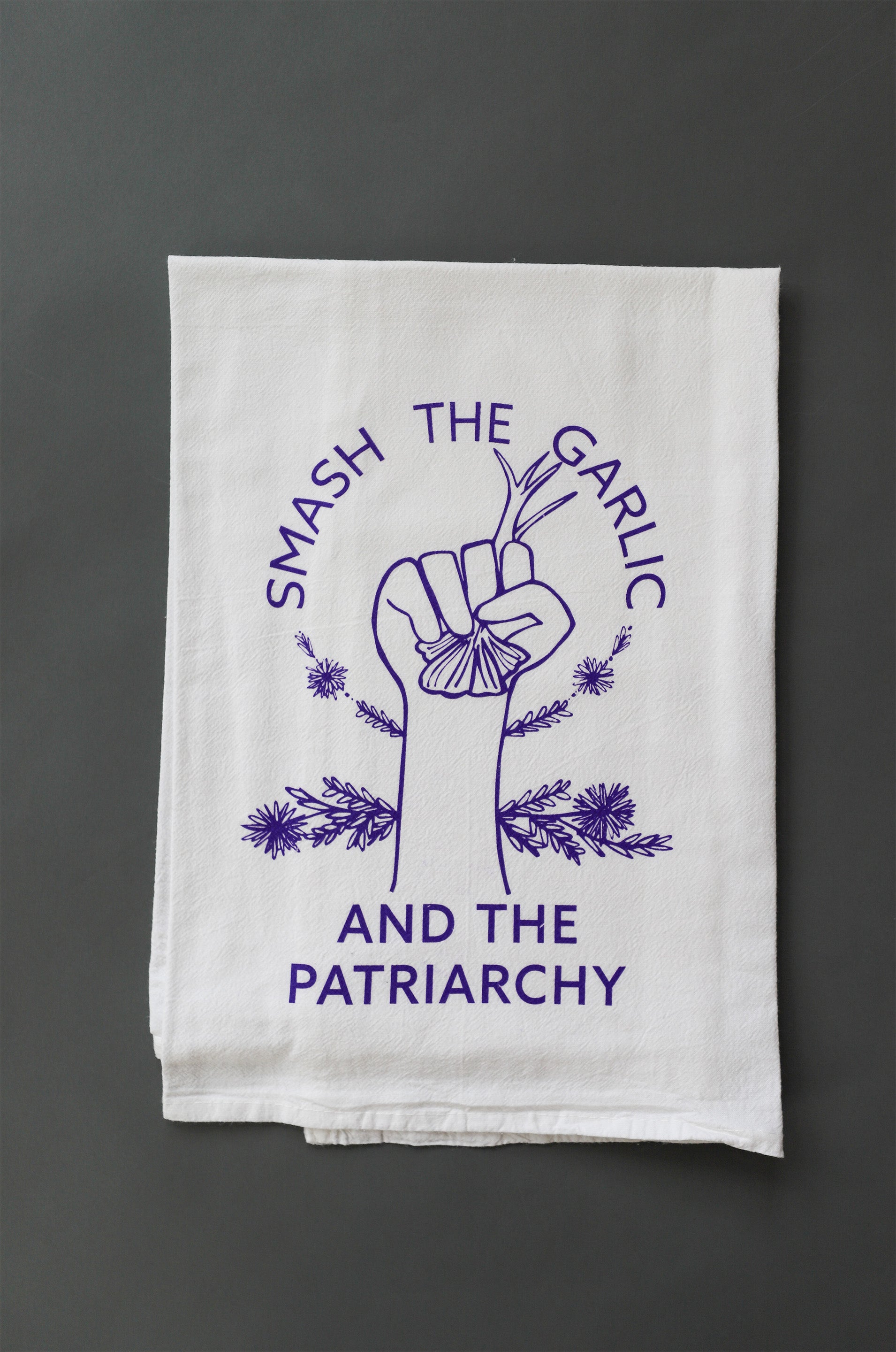 http://www.overseasoned.com/cdn/shop/products/smashthegarlicandthepatriarchypurpleteatowel.jpg?v=1674674802